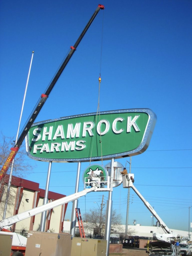 Shamrock Farms sign being worked on